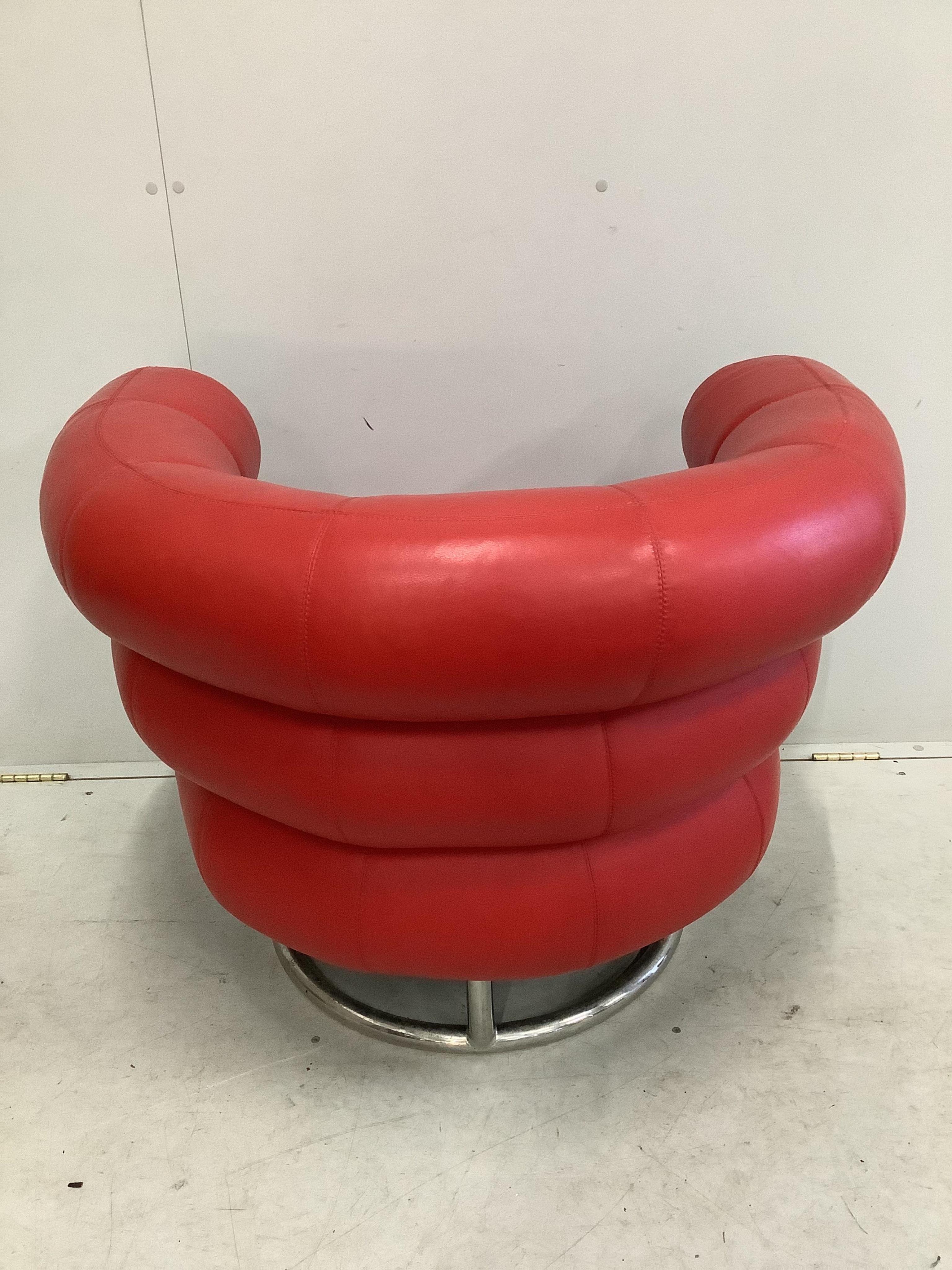 A Contemporary Eileen Gray Bibendum red leather armchair, width 92cm, depth 74cm, height 74cm. Condition - good